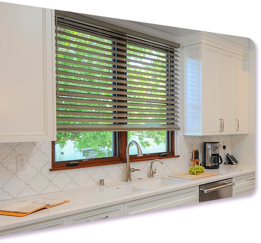 White kitchen with wood venetian blinds, arabesque tile backsplash, and garden window view
